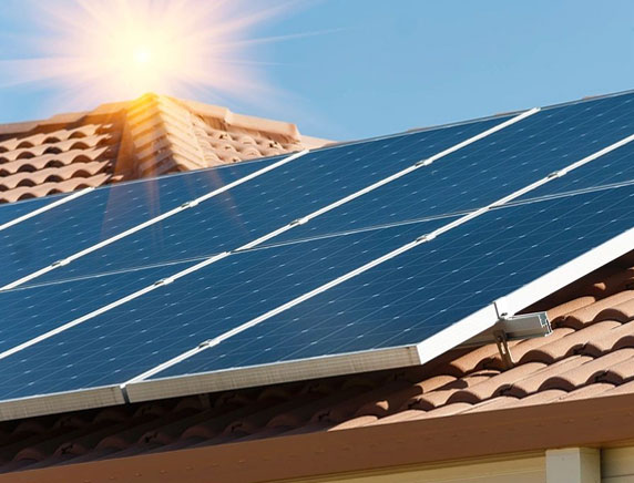 solar panels on roof on a sunny day